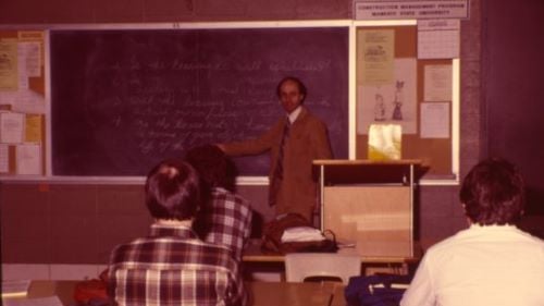 Construction Management professor teaching a class from the 1980s