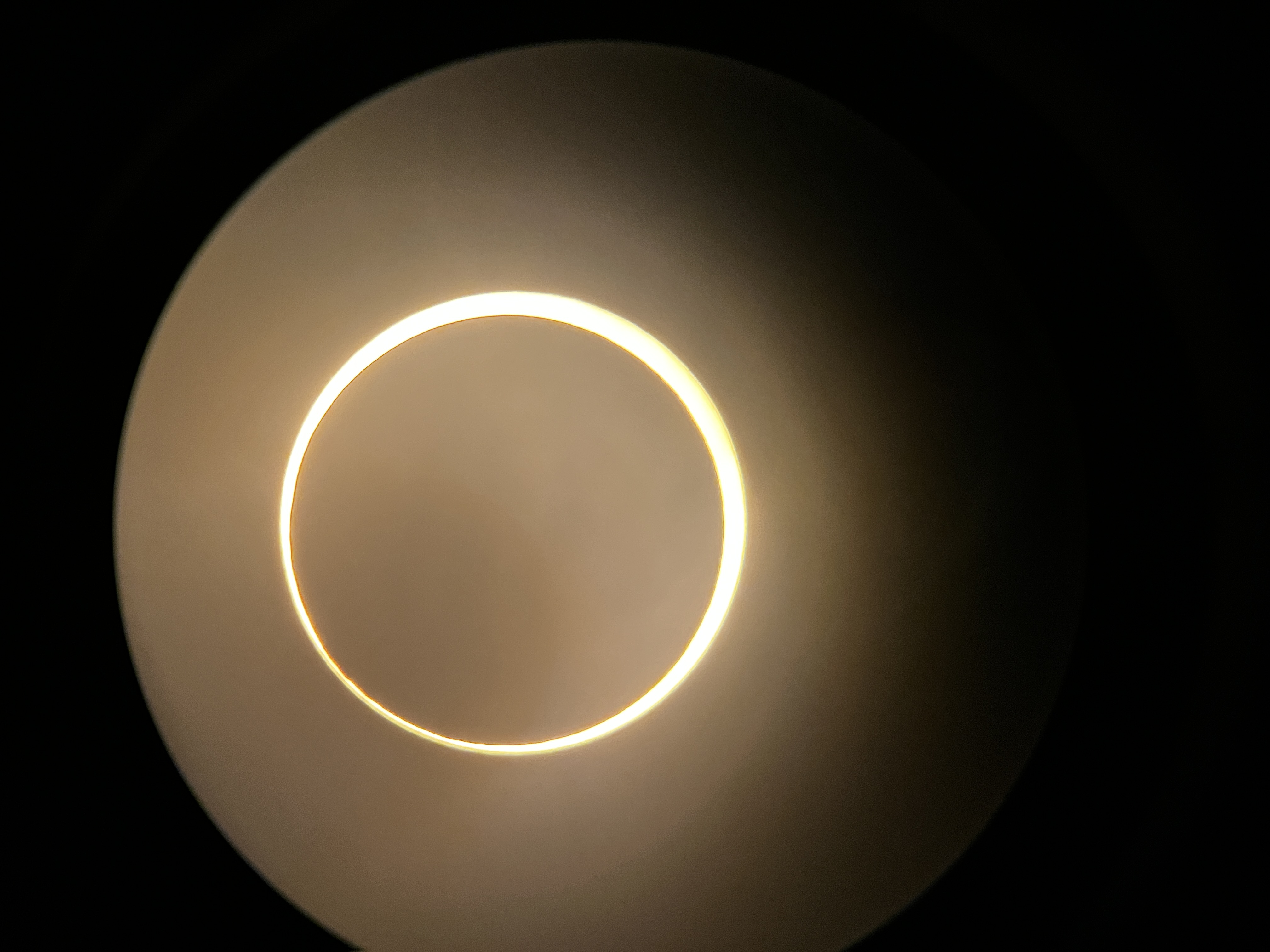 a circle of light in a black background