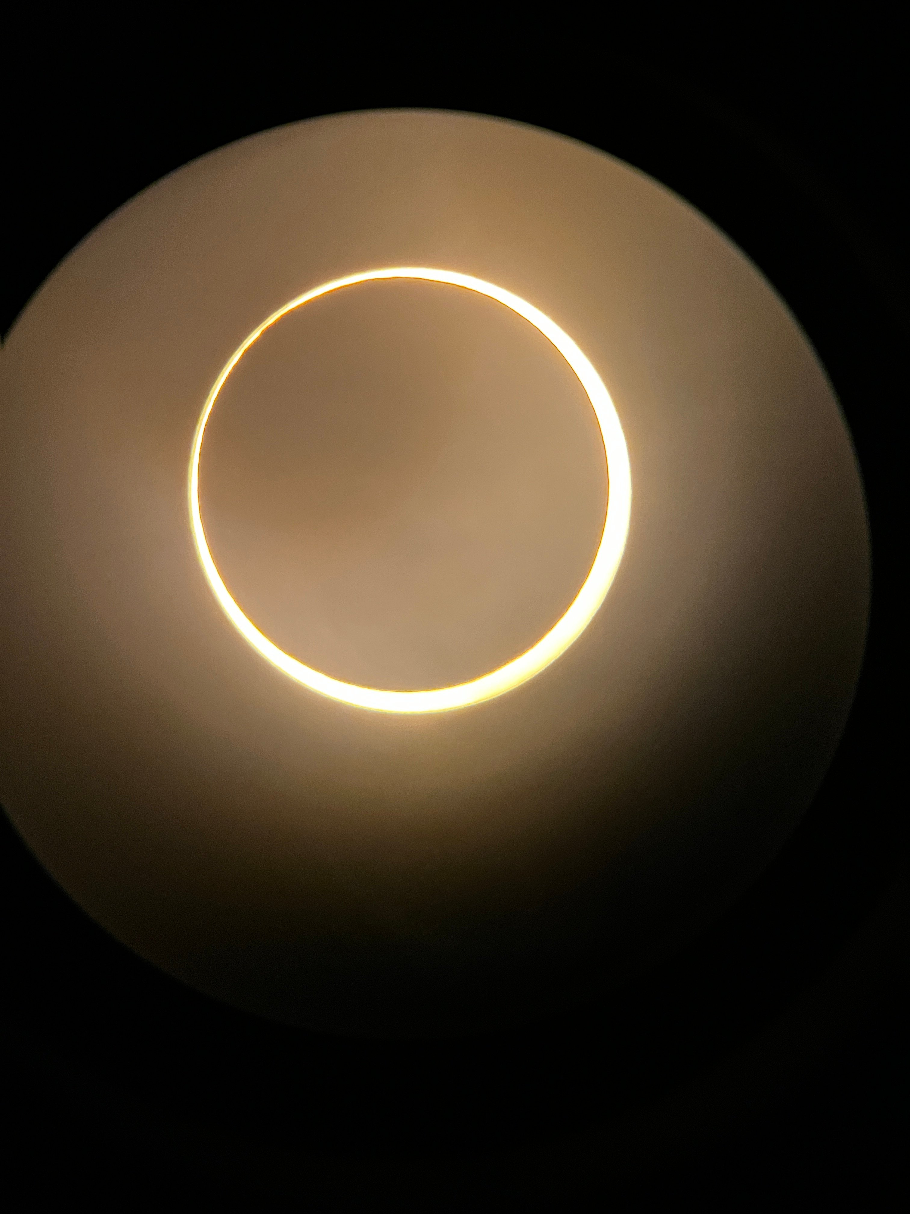 a circle of light in a black background