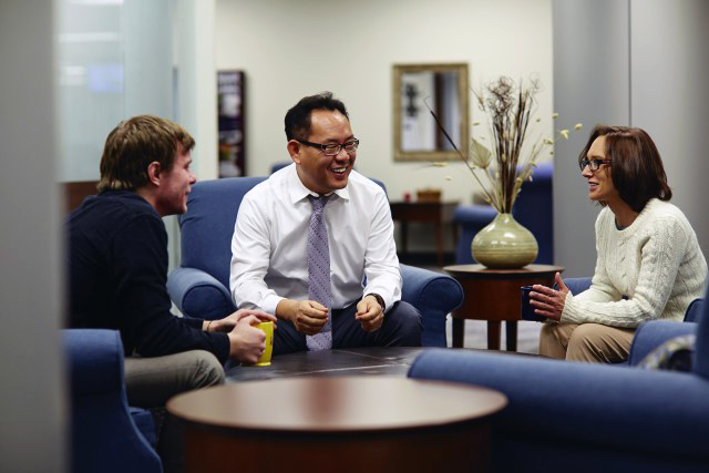 a group of people sitting in a circle