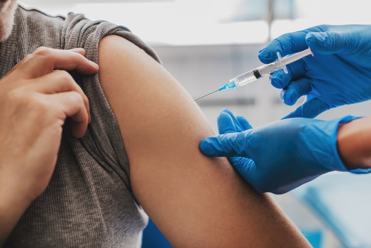 person receiving vaccine shot