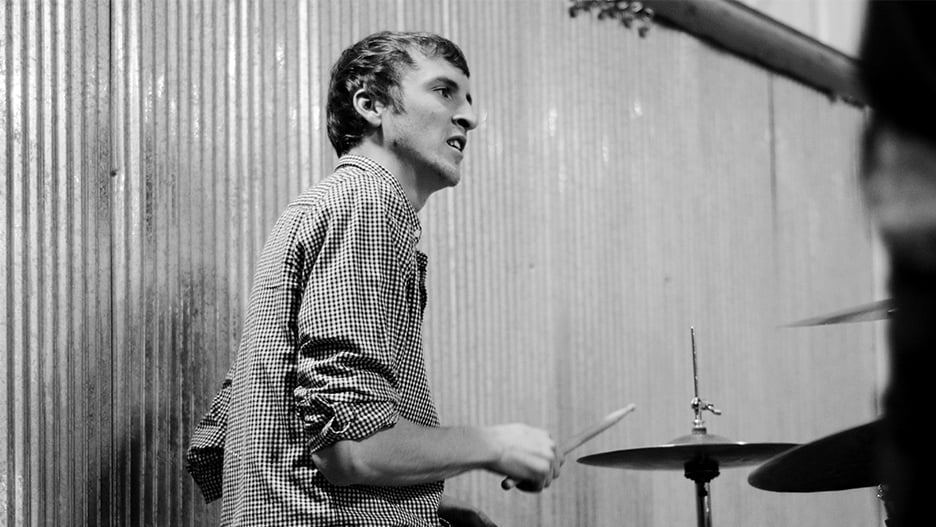 a person playing drums