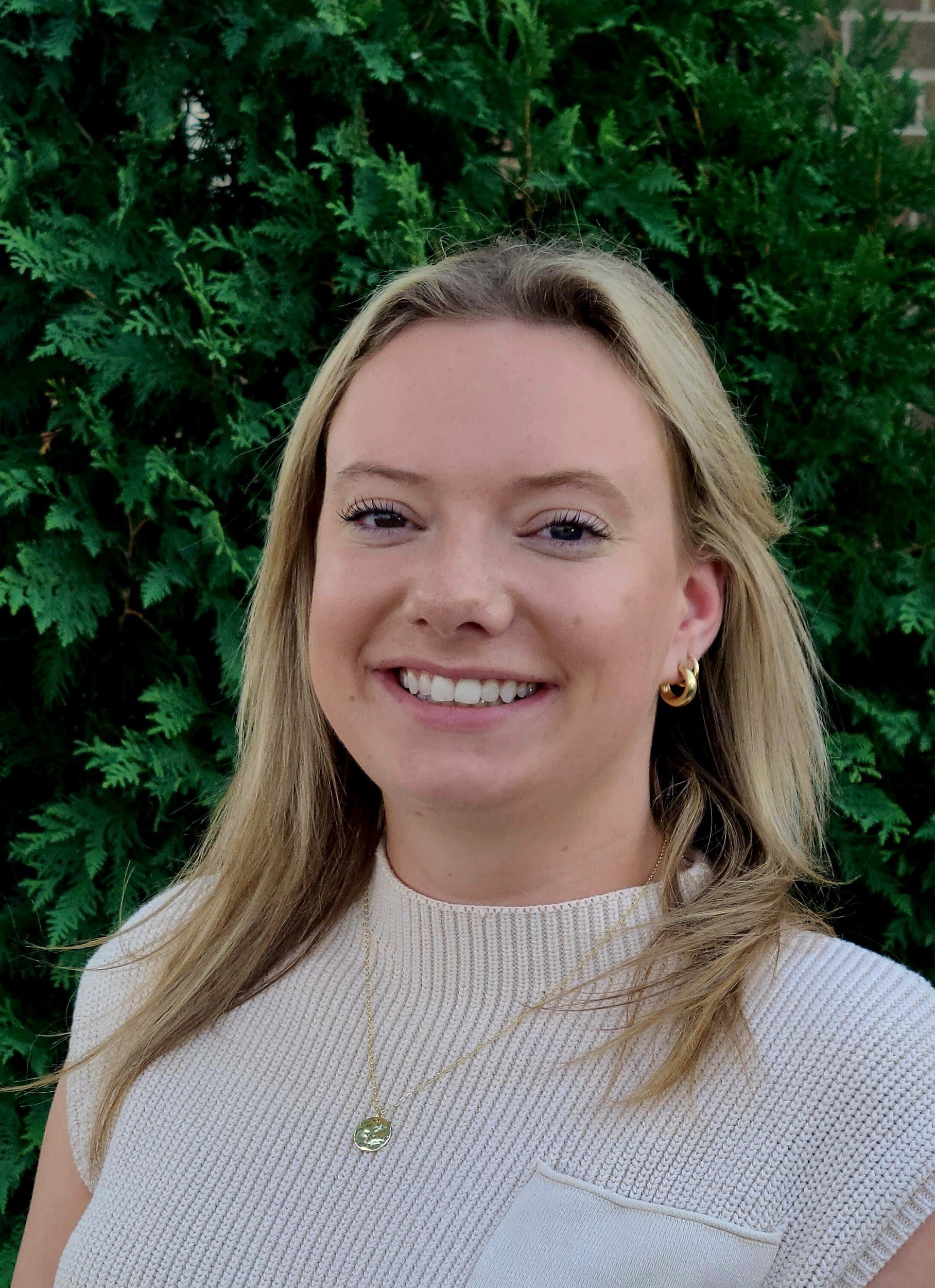 a person smiling at camera