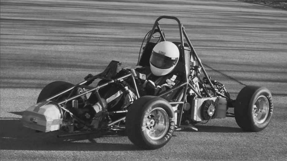 Black and white picture of a formula car