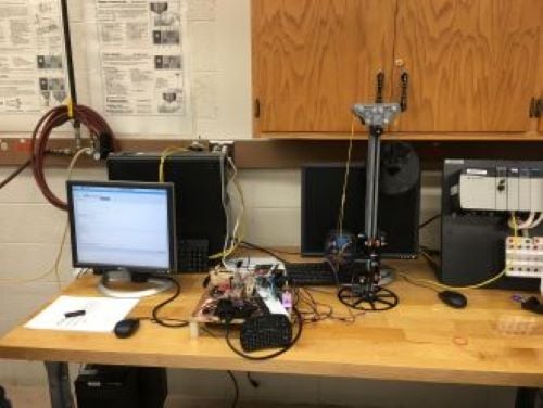 manufacturing engineering equipment on a table in the manufacturing automation laboratory