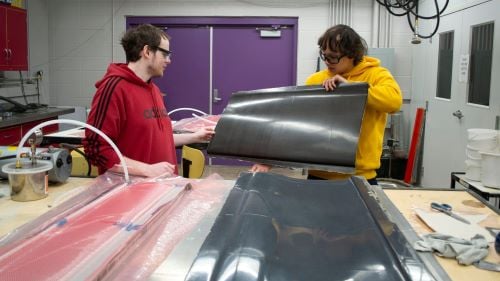 Two students working on composite lay-ups in the Composites Lab