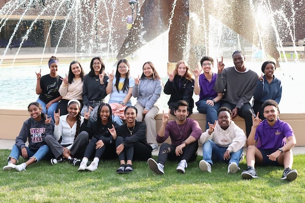 a group of people posing for a photo