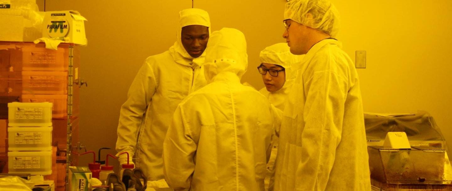 students in the lab wearing protective clothing