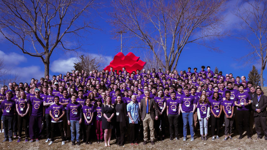 a group of people posing for a photo