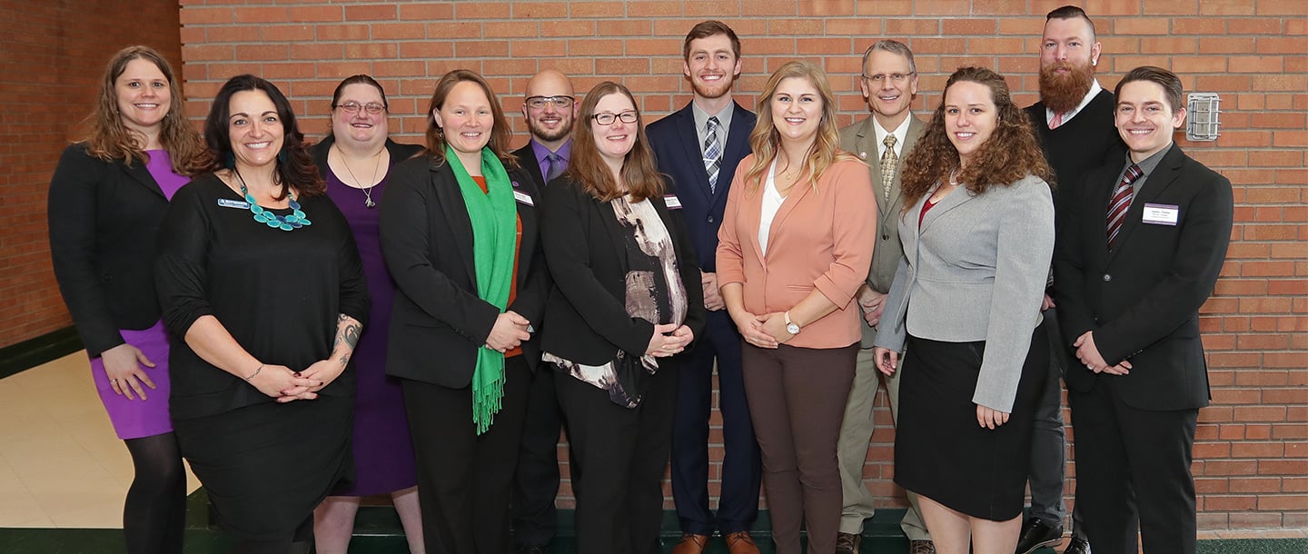 Bell Facilitators faculty posing in the hallway