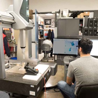 Student in the Geometric Dimensioning and Tolerancing lab