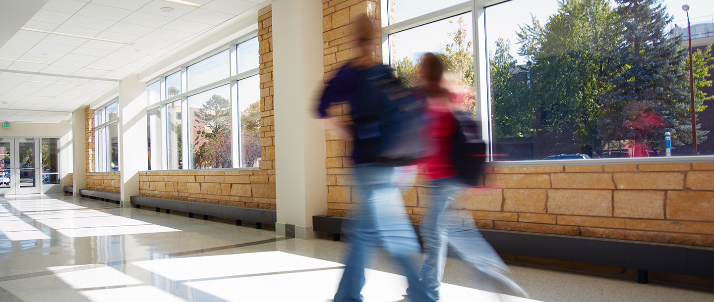 Students walking in the residence hall